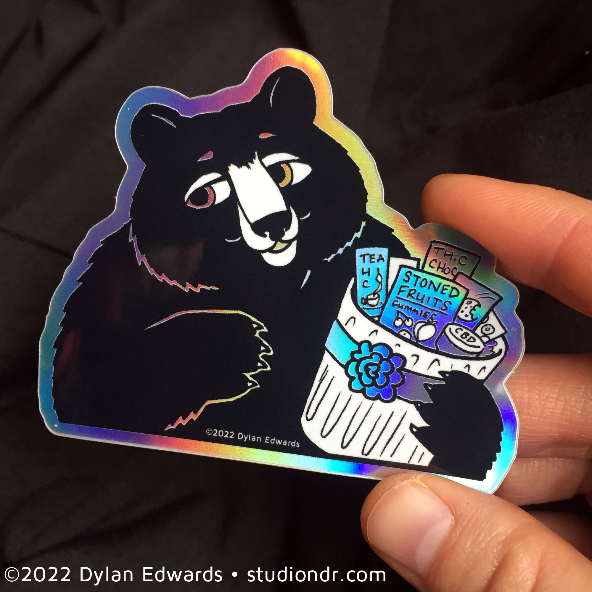 Cannabear holographic vinyl sticker of stoner bear with edibles